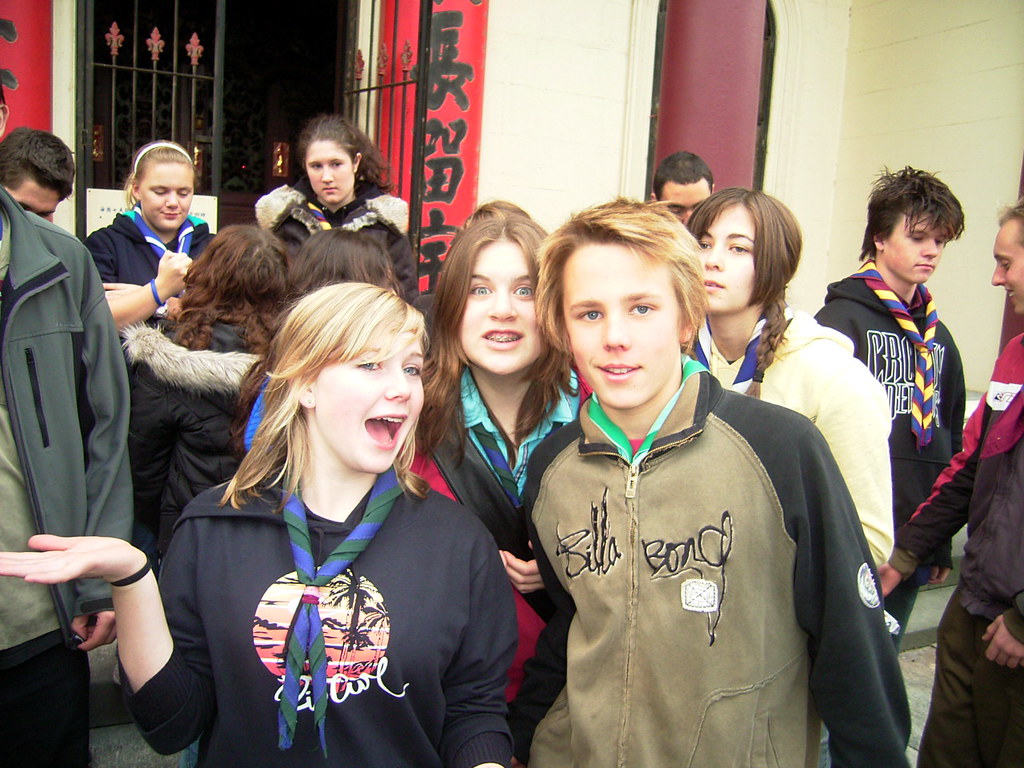 a group photo in front of the door